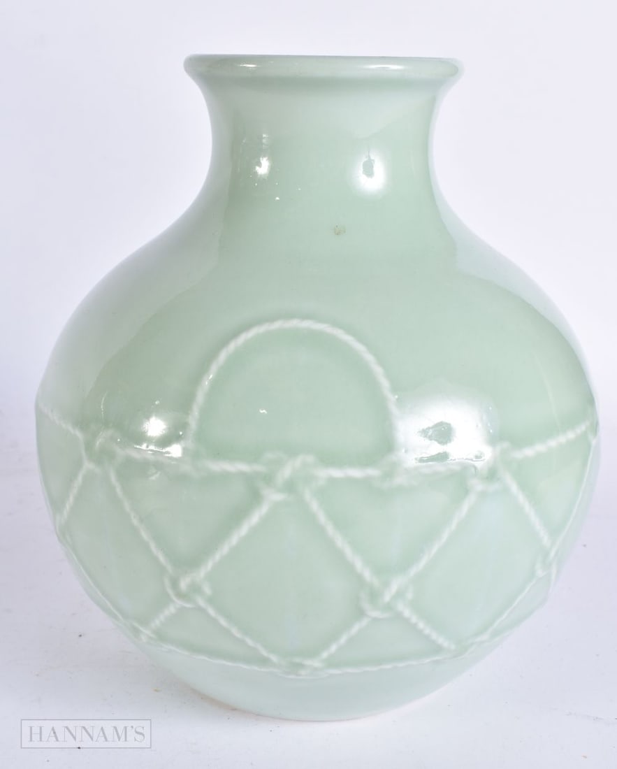 AN UNUSUAL CHINESE CELADON PORCELAIN VASE. 18 cm 12 cm.: AN UNUSUAL CHINESE CELADON PORCELAIN VASE. 18 cm 12 cm.