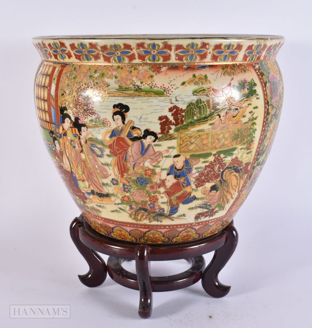 A MODERN CHINESE JARDINIERE upon a wooden stand. 32 cm x 25 cm. (1 of 4)