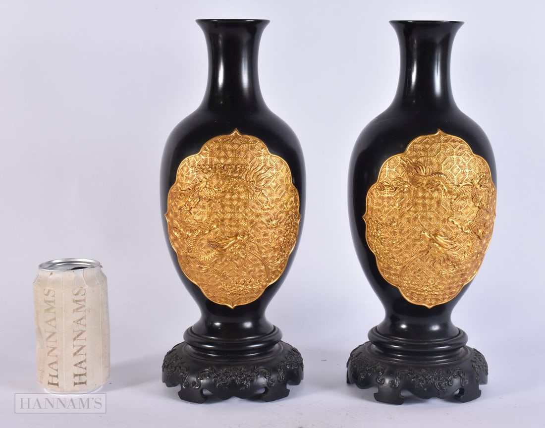 A PAIR OF CHINESE BLACK AND GOLD LACQUER DRAGON VASES. 33 cm high. (1 of 4)