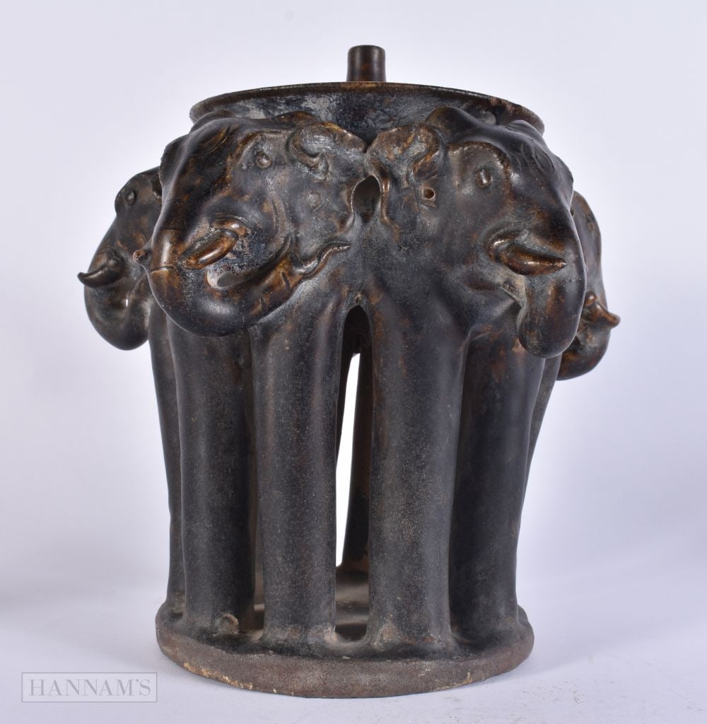 AN UNUSUAL 19TH CENTURY SOUTH EAST ASIAN POTTERY INCENSE BURNER formed with multiple standing elepha (1 of 4)