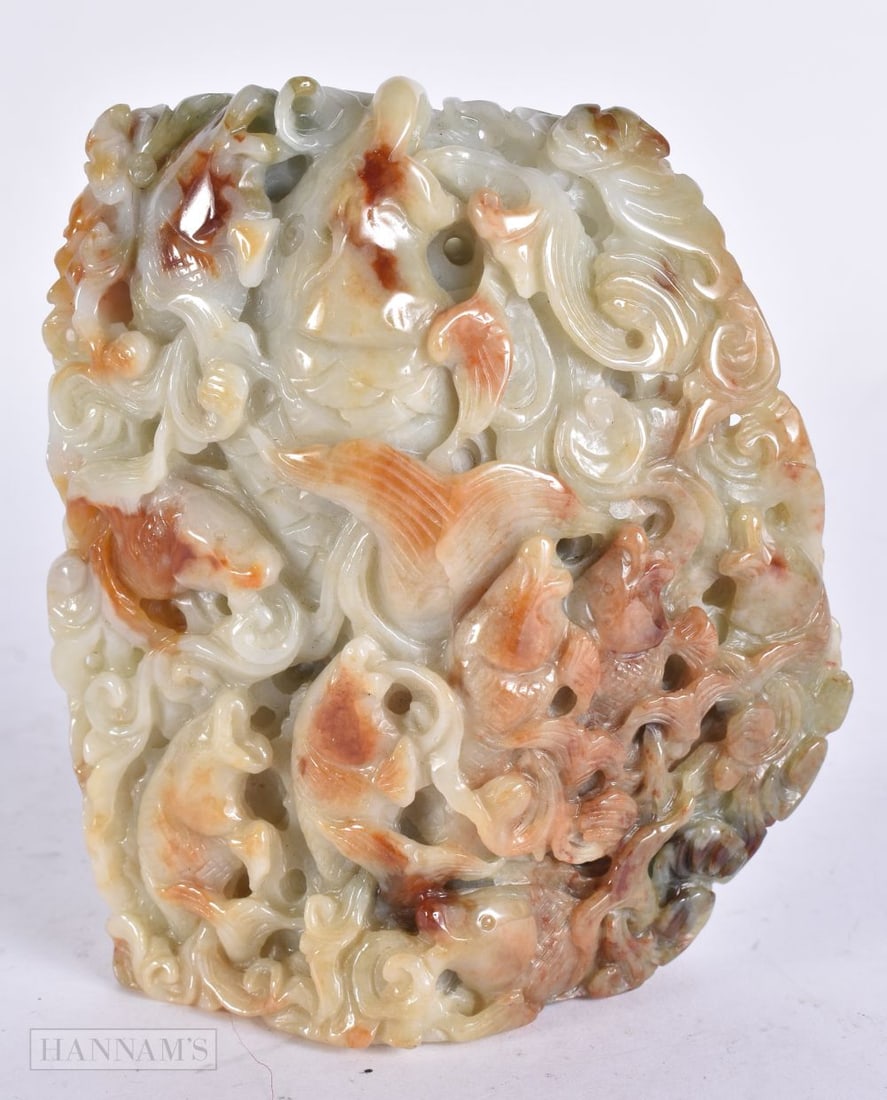A CHINESE JADEITE BOULDER. 13 cm x 9 cm. (1 of 4)