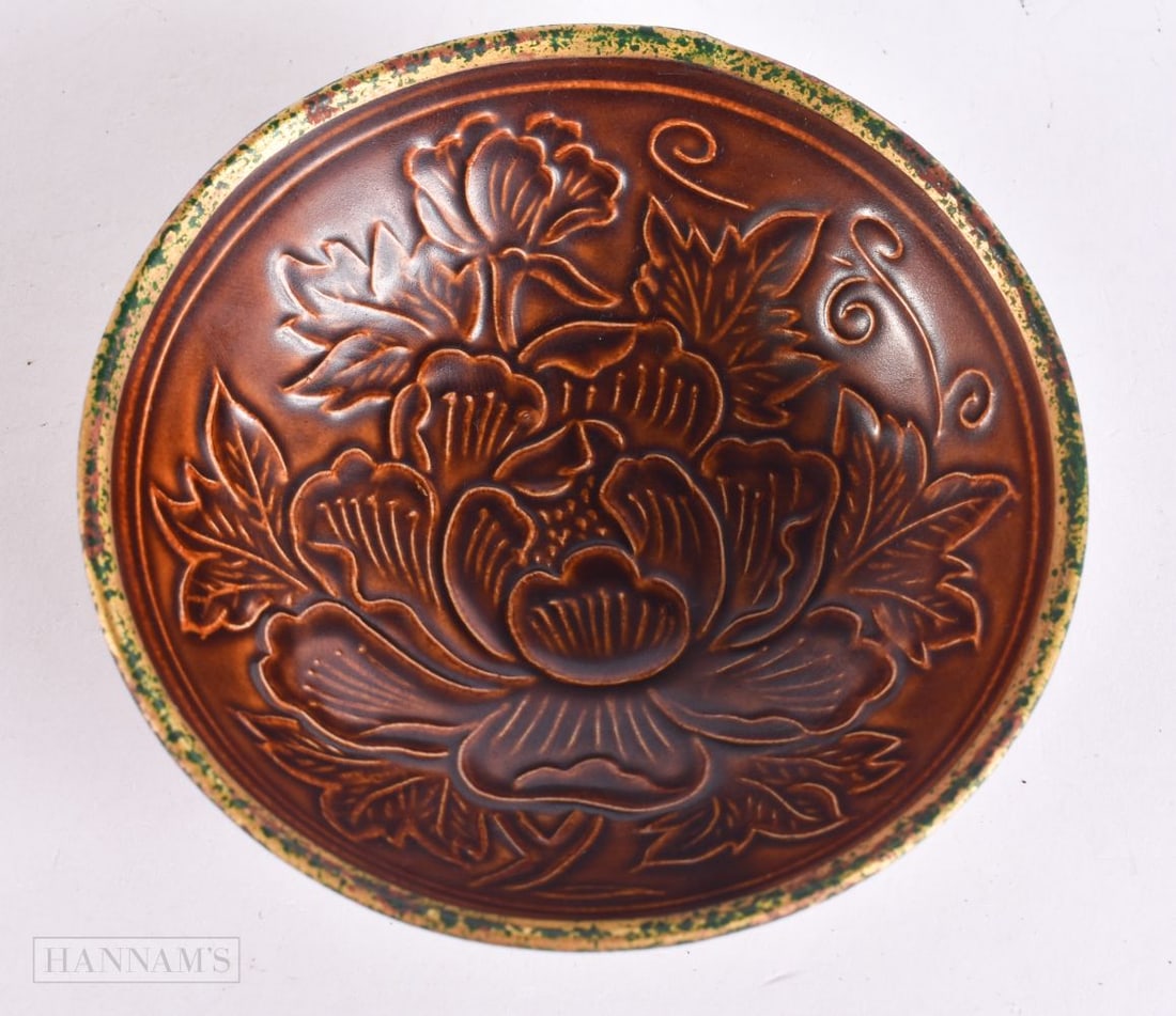 A CHINESE BROWN GLAZED PORCELAIN BOWL. 13 cm wide.: A CHINESE BROWN GLAZED PORCELAIN BOWL. 13 cm wide.