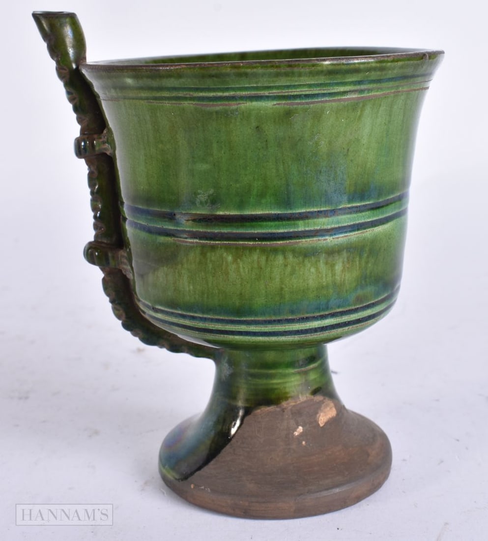 A CHINESE GREEN GLAZED CUP. 11 cm high. (1 of 5)