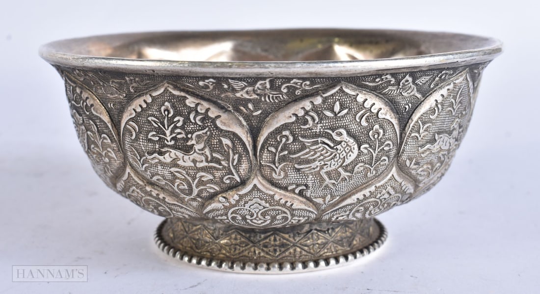 A CHINESE WHITE METAL BOWL. 11 cm wide.: A CHINESE WHITE METAL BOWL. 11 cm wide.