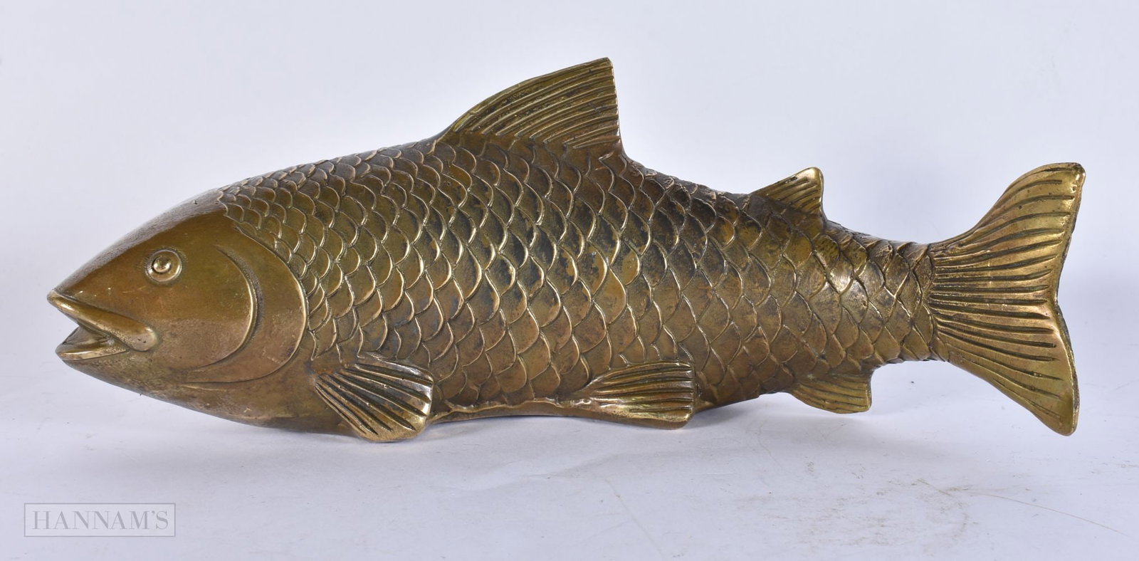 A CHINESE BRONZE FISH. 25 cm wide.: A CHINESE BRONZE FISH. 25 cm wide.