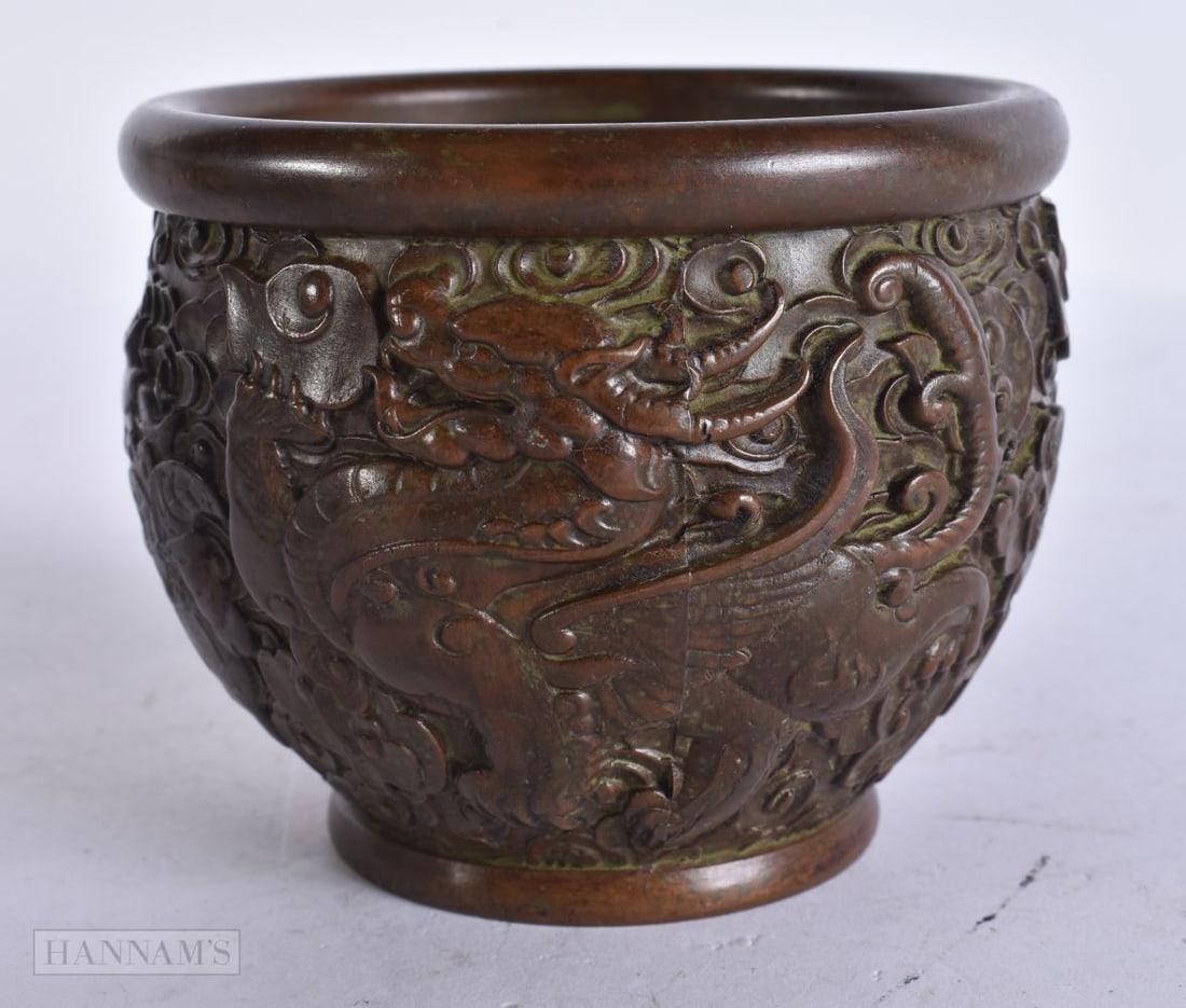 A CHINESE BRONZE DRAGON CENSER. 11 cm x 8.5 cm.: A CHINESE BRONZE DRAGON CENSER. 11 cm x 8.5 cm.