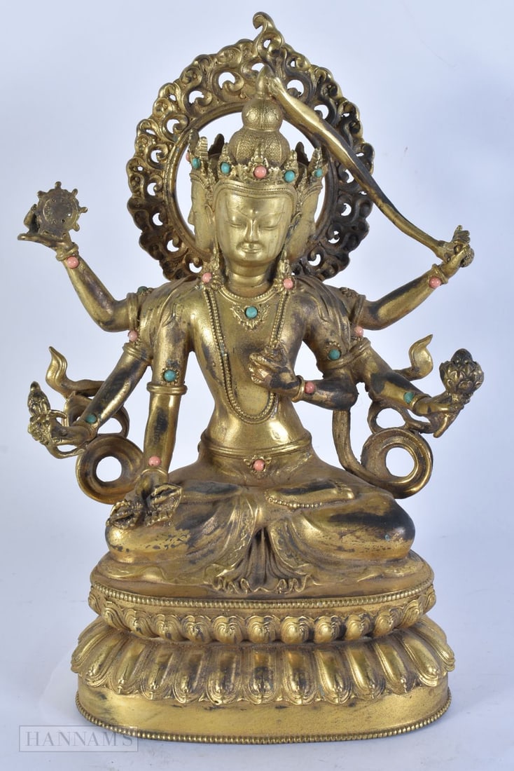 A TIBETAN GILT BRONZE BUDDHA. 22 cm x 14 cm.: A TIBETAN GILT BRONZE BUDDHA. 22 cm x 14 cm.