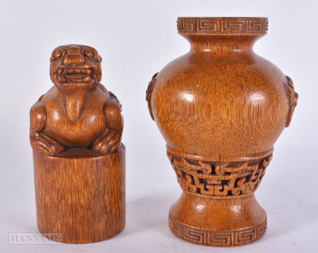 A CHINESE BUFFALO HORN TYPE SEAL together with a similar vase. Largest 15 cm high. (2): A CHINESE BUFFALO HORN TYPE SEAL together with a similar vase. Largest 15 cm high. (2)