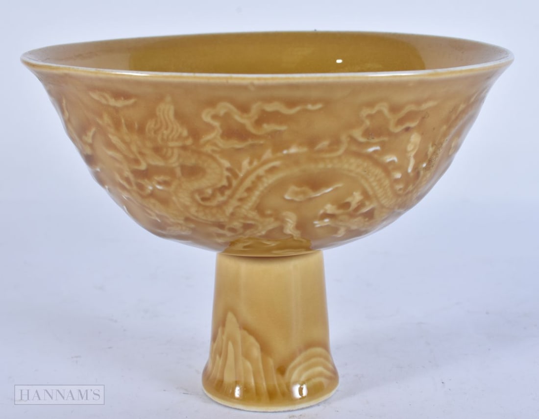 A CHINESE YELLOW GLAZED PORCELAIN STEM CUP. 13 cm wide.: A CHINESE YELLOW GLAZED PORCELAIN STEM CUP. 13 cm wide.