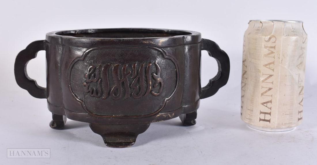 A CHINESE ISLAMIC MARKET TWIN HANDLED BRONZE CENSER. 23 cm wide. (1 of 5)