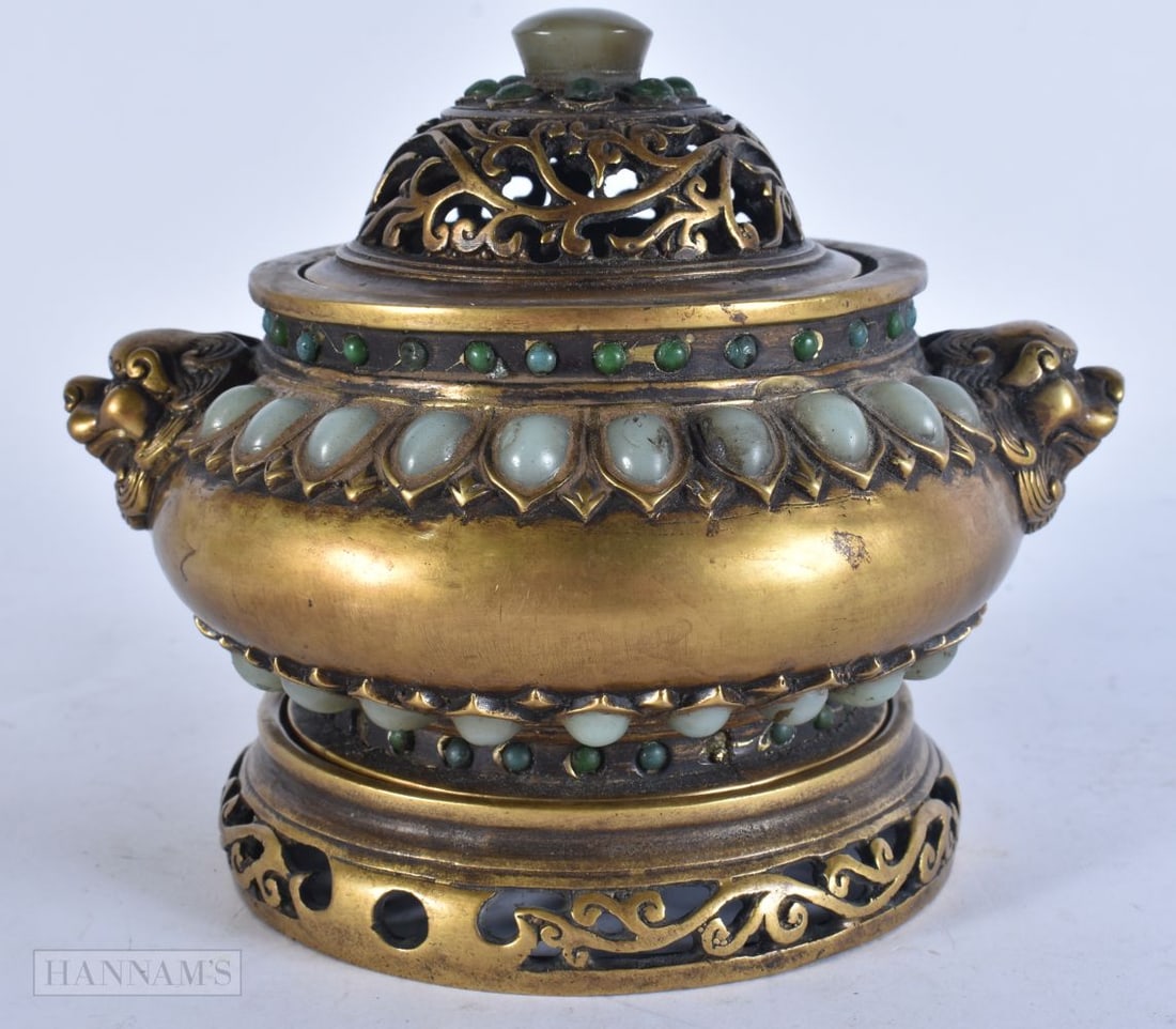 A CHINESE JADE INSET BRONZE CENSER ON STAND. 16 cm wide.: A CHINESE JADE INSET BRONZE CENSER ON STAND. 16 cm wide.