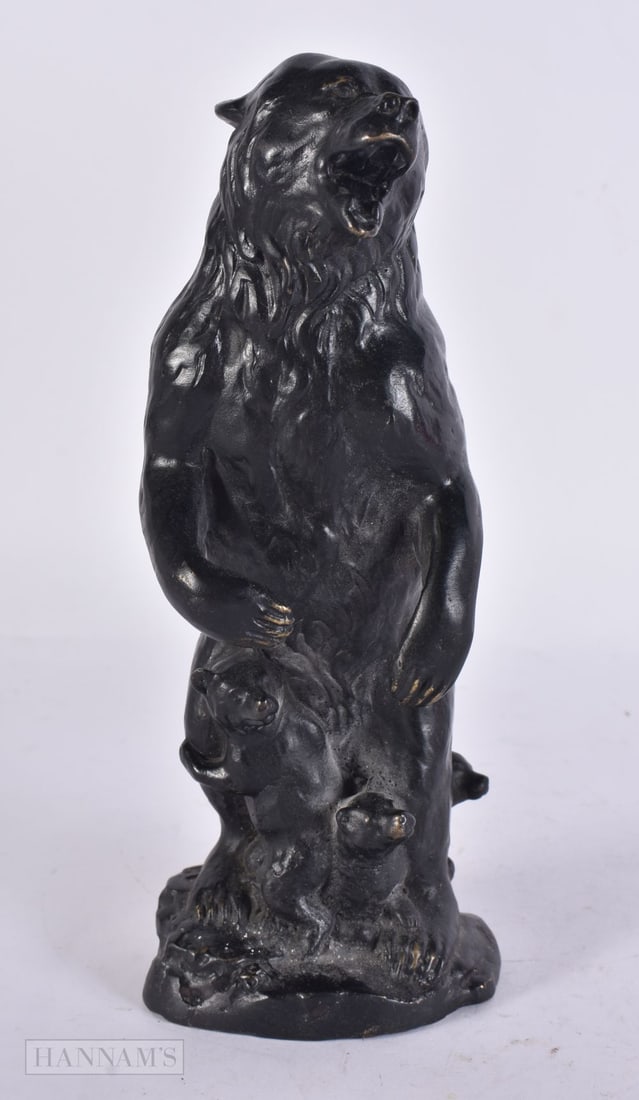A BRONZE BEAR. 23 cm high. (1 of 5)