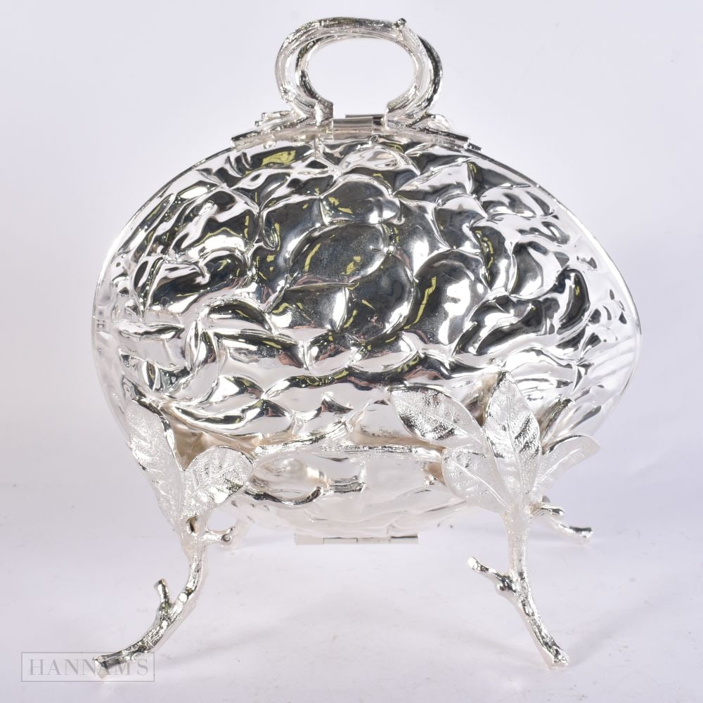 A SILVER PLATED WALNUT BOX. 24 cm x 14 cm.: A SILVER PLATED WALNUT BOX. 24 cm x 14 cm.