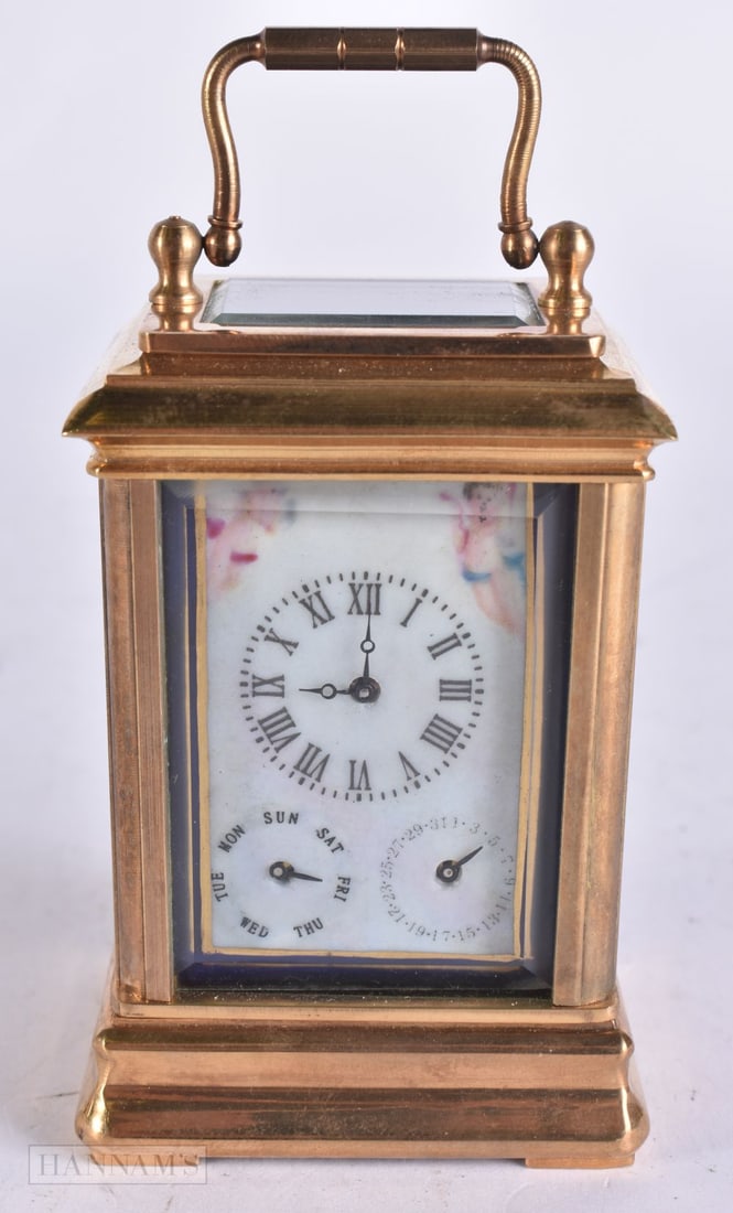A PORCELAIN INSET CARRIAGE CLOCK. Running. 10.5 cm high inc handle. (1 of 8)