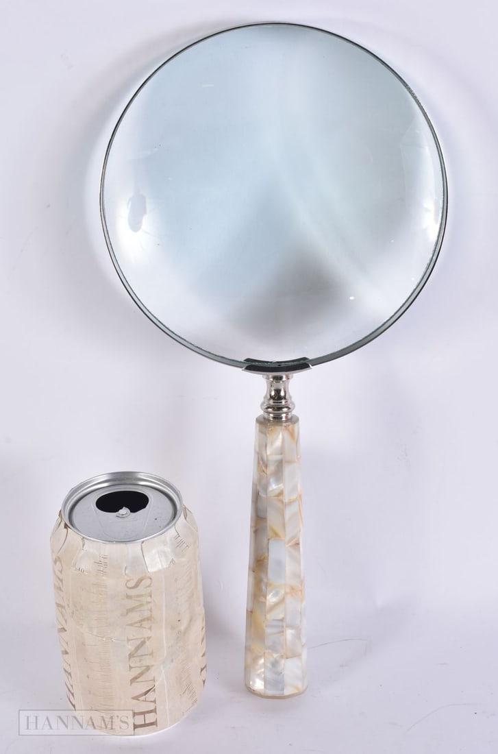 A MOTHER OF PEARL MAGNIFYING GLASS. 32 cm long. (1 of 2)