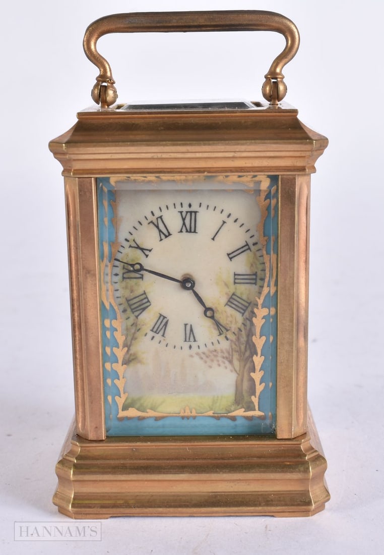 A MINIATURE PORCELAIN INSET CARRIAGE CLOCK. Running. 9.75 cm high inc handle. (1 of 7)