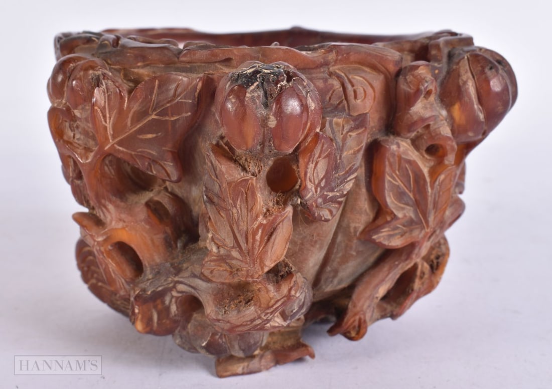 A CHINESE CARVED BUFFALO HORN TYPE LIBATION CUP. 13 cm wide. (1 of 5)