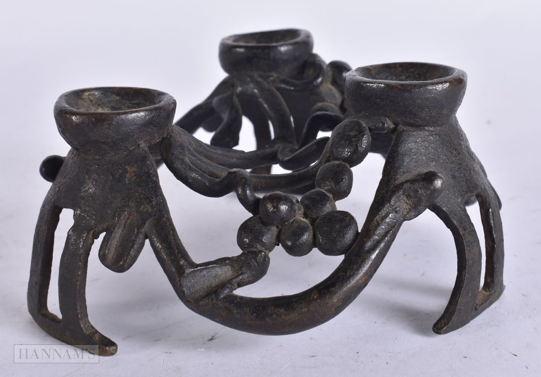 A CHINESE QING DYNASTY BRONZE CENSER STAND. 12 cm x 10 cm.: A CHINESE QING DYNASTY BRONZE CENSER STAND. 12 cm x 10 cm.