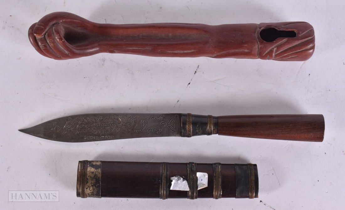 AN ASIAN KNIFE and a pipe holder. 27 cm long. (2) WE ARE UNABLE TO OFFER IN-HOUSE SHIPPING ON THI (1 of 6)