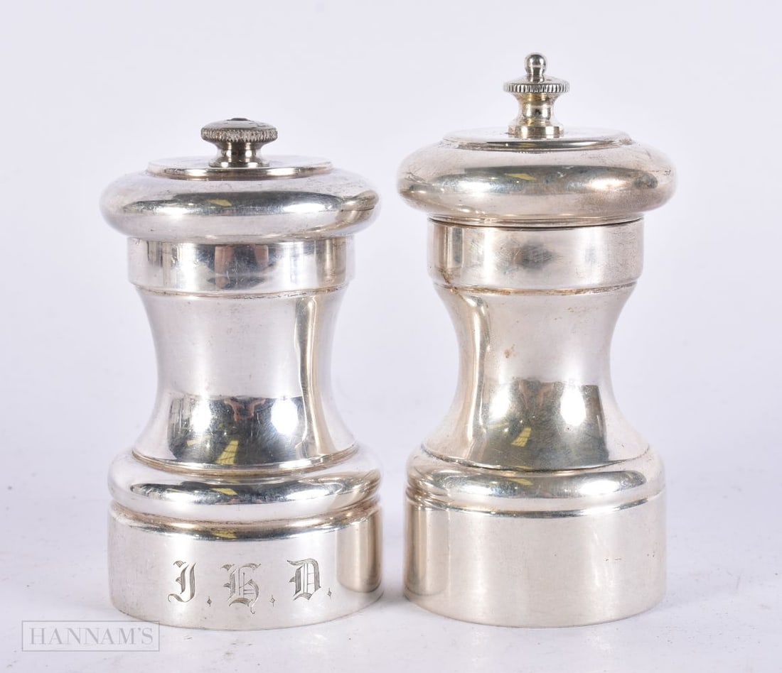 A PAIR OF SILVER SALT & PEPPER GRINDERS. 374 grams overall. 10 cm high. (1 of 4)