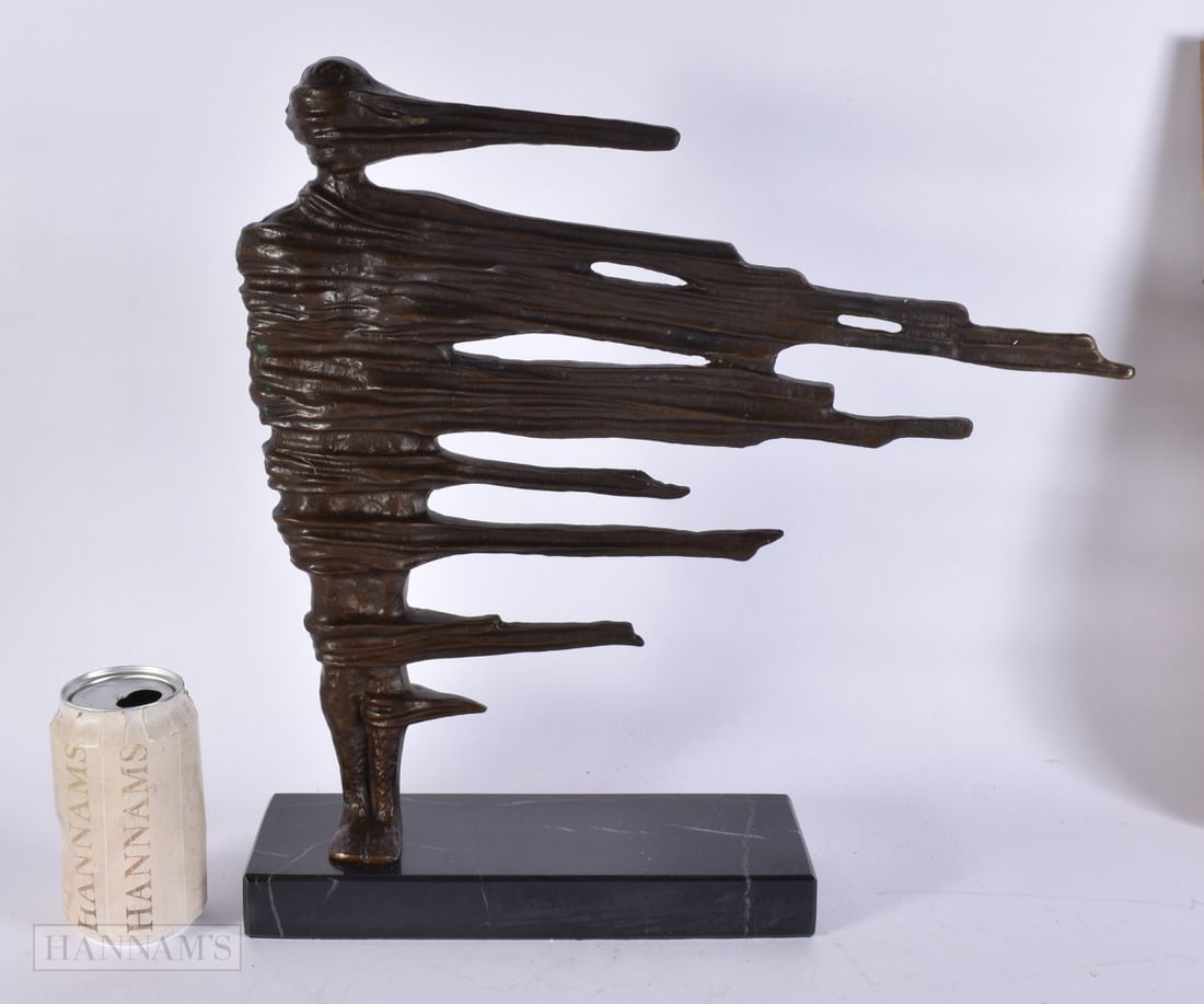 AN ABSTRACT WINDSWEPT BRONZE SCULPTURE. 40 cm x 34 cm. (1 of 5)