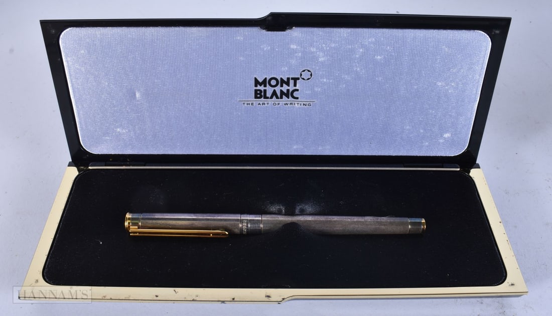 A SILVER MONTBLANC PEN. 13.5 cm long.: A SILVER MONTBLANC PEN. 13.5 cm long.