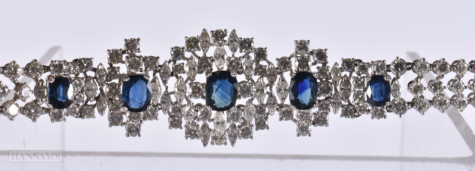 A FINE 18CT GOLD DIAMOND AND SAPPHIRE BRACELET. 34 grams. 18 cm x 2.5 cm.: A FINE 18CT GOLD DIAMOND AND SAPPHIRE BRACELET. 34 grams. 18 cm x 2.5 cm.
