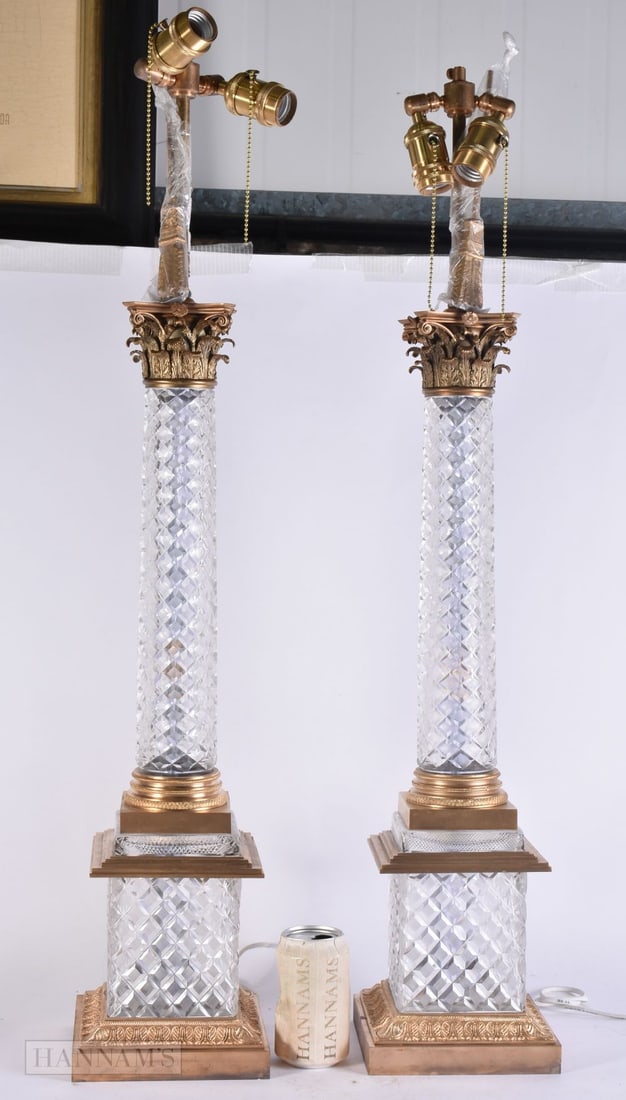 A VERY LARGE PAIR OF BRONZE CUT CRYSTAL GLASS COUNTRY HOUSE LAMPS. 88 cm high.: A VERY LARGE PAIR OF BRONZE CUT CRYSTAL GLASS COUNTRY HOUSE LAMPS. 88 cm high.