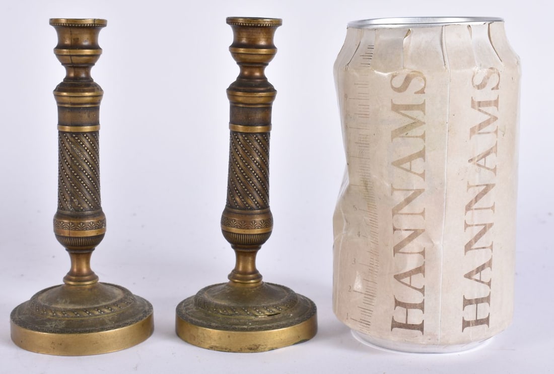 A RARE PAIR OF 19TH CENTURY FRENCH BRONZE EMPIRE CANDLESTICKS. 12 cm high. (1 of 4)
