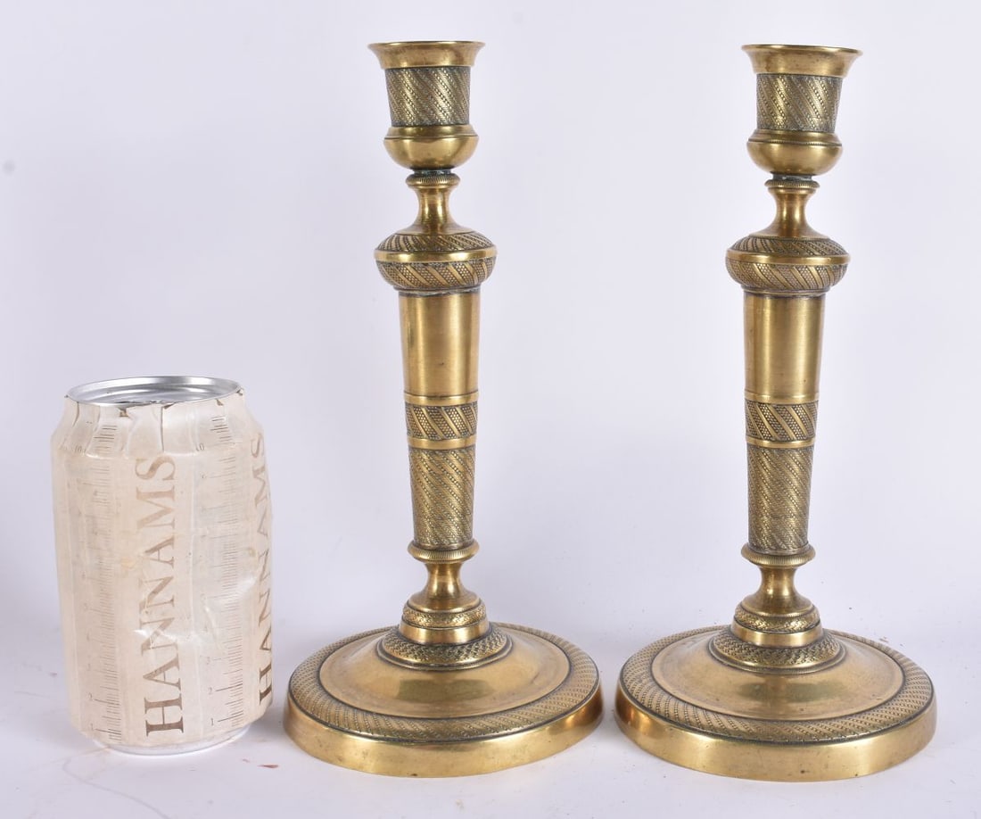 A PAIR OF 19TH CENTURY FRENCH EMPIRE BRONZE CANDLESTICKS. 22.5 cm high.: A PAIR OF 19TH CENTURY FRENCH EMPIRE BRONZE CANDLESTICKS. 22.5 cm high.