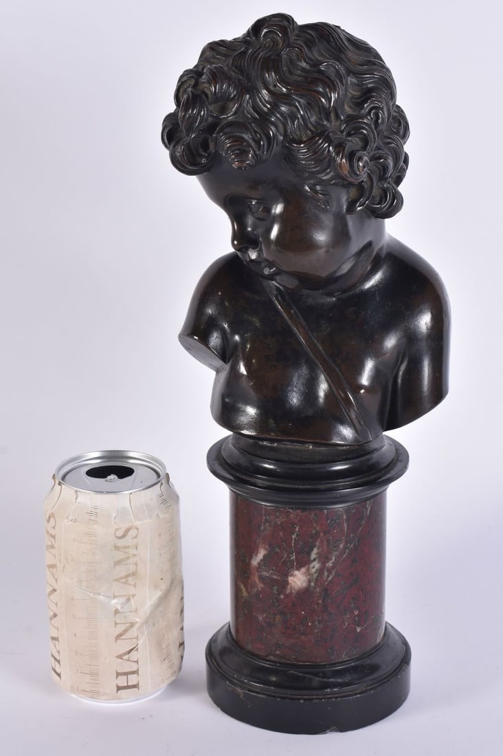 A LARGE 18TH/19TH CENTURY FRENCH BRONZE PUTTI BUST modelled upon a marble plinth. 33 cm high.: A LARGE 18TH/19TH CENTURY FRENCH BRONZE PUTTI BUST modelled upon a marble plinth. 33 cm high.