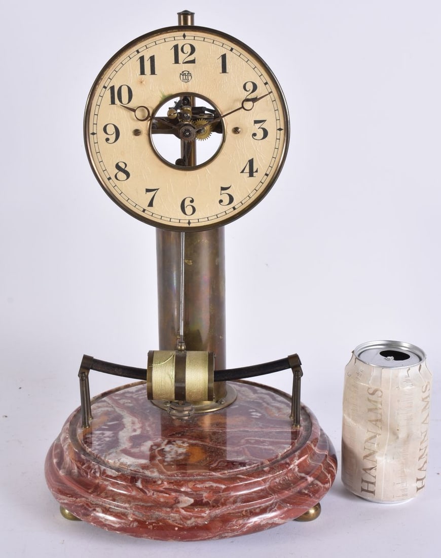 AN UNUSUAL LARGE EARLY 20TH CENTURY ELECTRIC BULLE-CLOCK with marble base. 37 cm x 17 cm.: AN UNUSUAL LARGE EARLY 20TH CENTURY ELECTRIC BULLE-CLOCK with marble base. 37 cm x 17 cm.