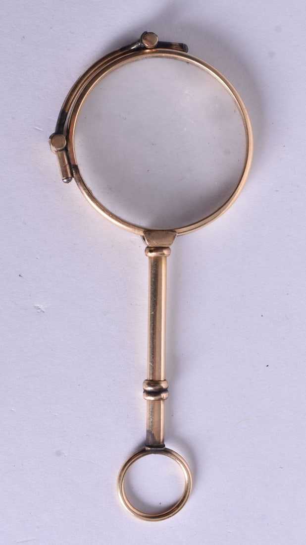 A PAIR OF YELLOW METAL LORGNETTES. 10.5 cm x 10.5 cm. (1 of 2)