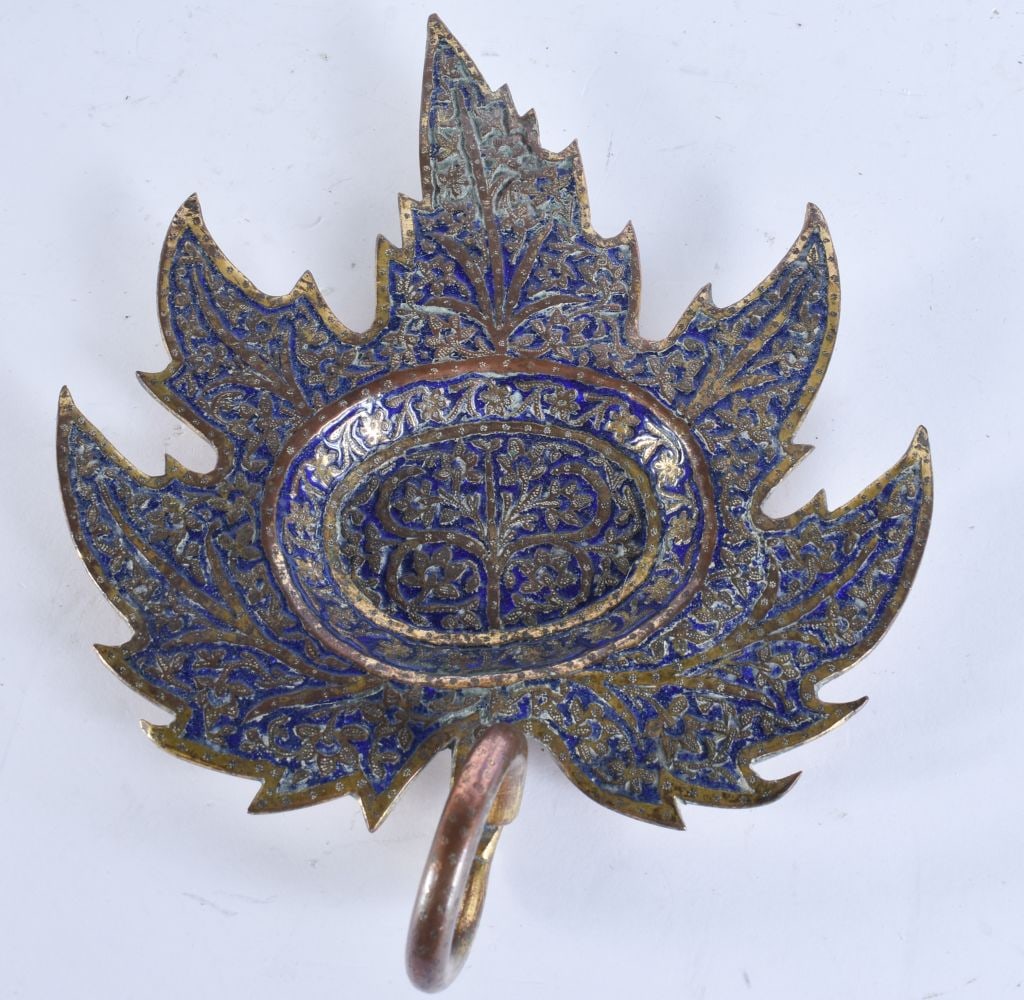 A 19TH CENTURY MIDDLE EASTERN INDIAN ENAMELLED BRONZE DISH formed as an open flower. 19 cm x 15 cm. (1 of 5)