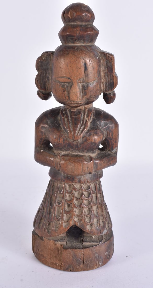 A 17TH/18TH CENTURY INDIAN CARVED WOOD DEITY. 23 cm high. (1 of 6)