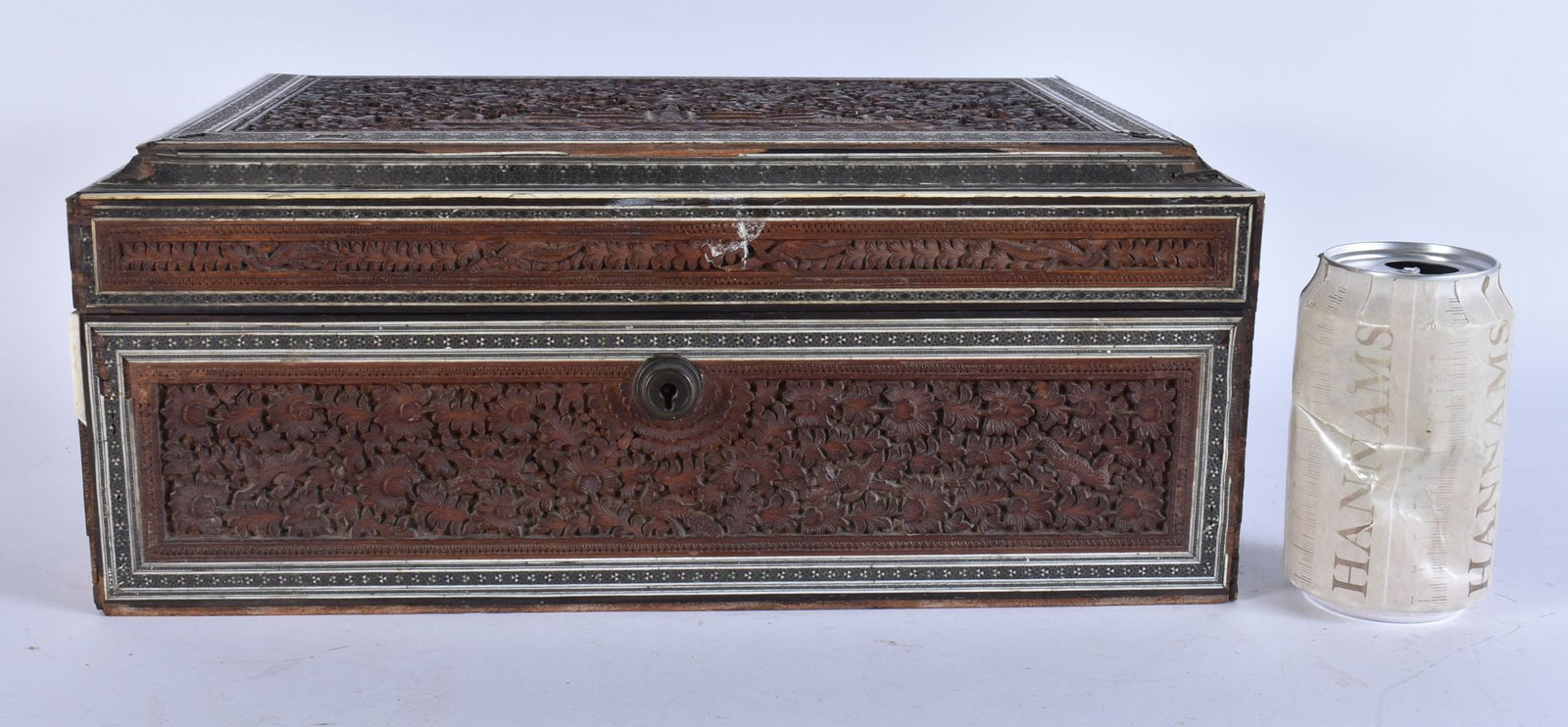 A LARGE 19TH CENTURY ANGLO INDIAN CARVED SANDALWOOD CASKET finely carved with landscapes, buildings: A LARGE 19TH CENTURY ANGLO INDIAN CARVED SANDALWOOD CASKET finely carved with landscapes, buildings and birds. 36 cm x 24 cm x 15 cm.