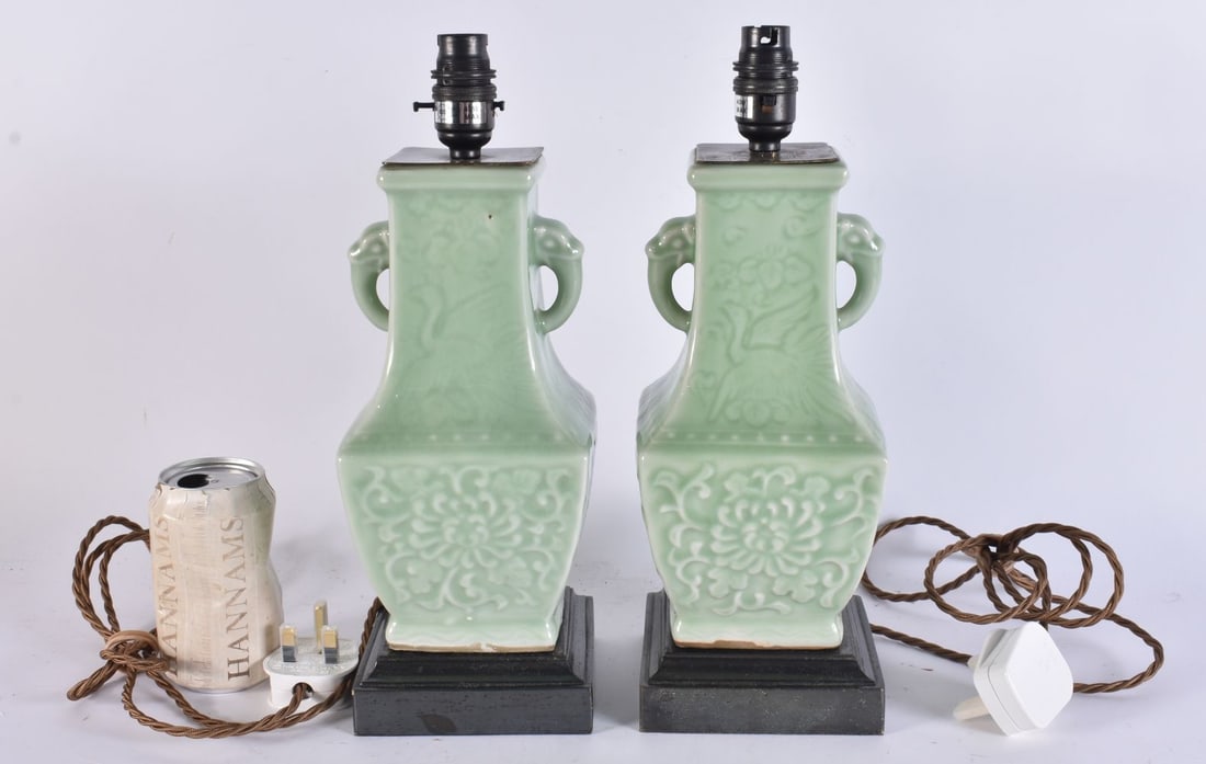 A PAIR OF EARLY 20TH CENTURY CHINESE CELADON TWIN HANDLED LAMPS Late Qing/Republic. 34 cm high.: A PAIR OF EARLY 20TH CENTURY CHINESE CELADON TWIN HANDLED LAMPS Late Qing/Republic. 34 cm high.