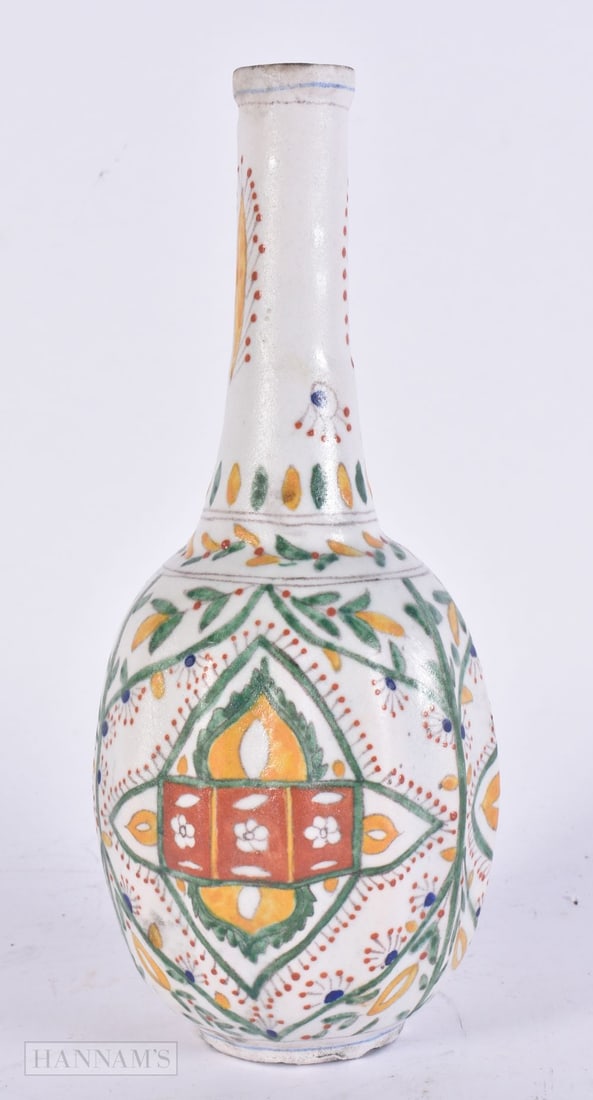 A TURKISH KUTAHYA POTTERY BOTTLE VASE. 24 cm high. (1 of 4)