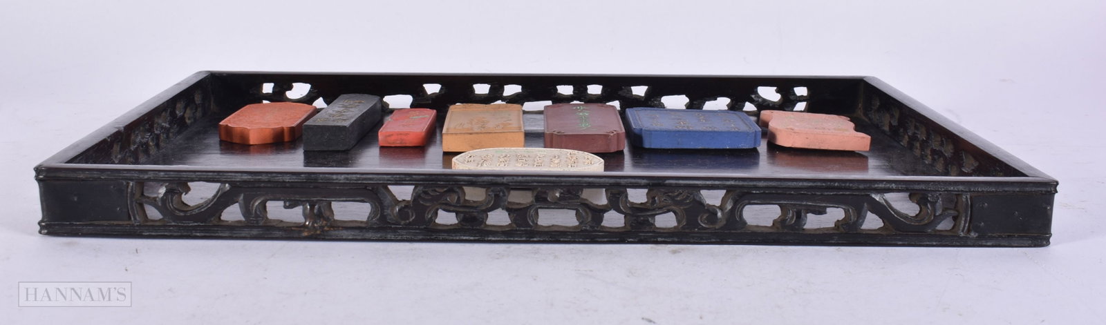A CHINESE QING DYNASTY CARVED ZITAN SCHOLARS TRAY together with various calligraphy ink cakes. Tray: A CHINESE QING DYNASTY CARVED ZITAN SCHOLARS TRAY together with various calligraphy ink cakes. Tray 32 cm x 20 cm. (qty)