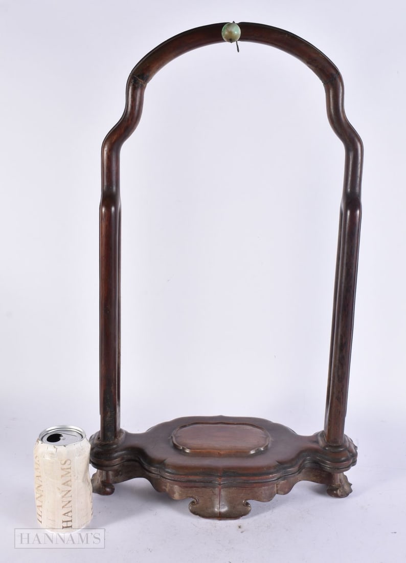 A FINE 18TH/19TH CENTURY CHINESE CARVED HUANGHUALI WOOD HANGING VASE STAND Qianlong/Jiaqing, with ja: A FINE 18TH/19TH CENTURY CHINESE CARVED HUANGHUALI WOOD HANGING VASE STAND Qianlong/Jiaqing, with jadeite finial. 56 cm x 28 cm.