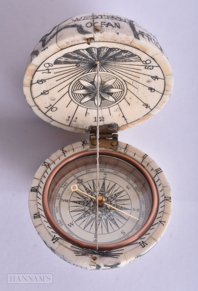 A SCRIMSHAW BONE COMPASS. 7 cm wide. (1 of 4)