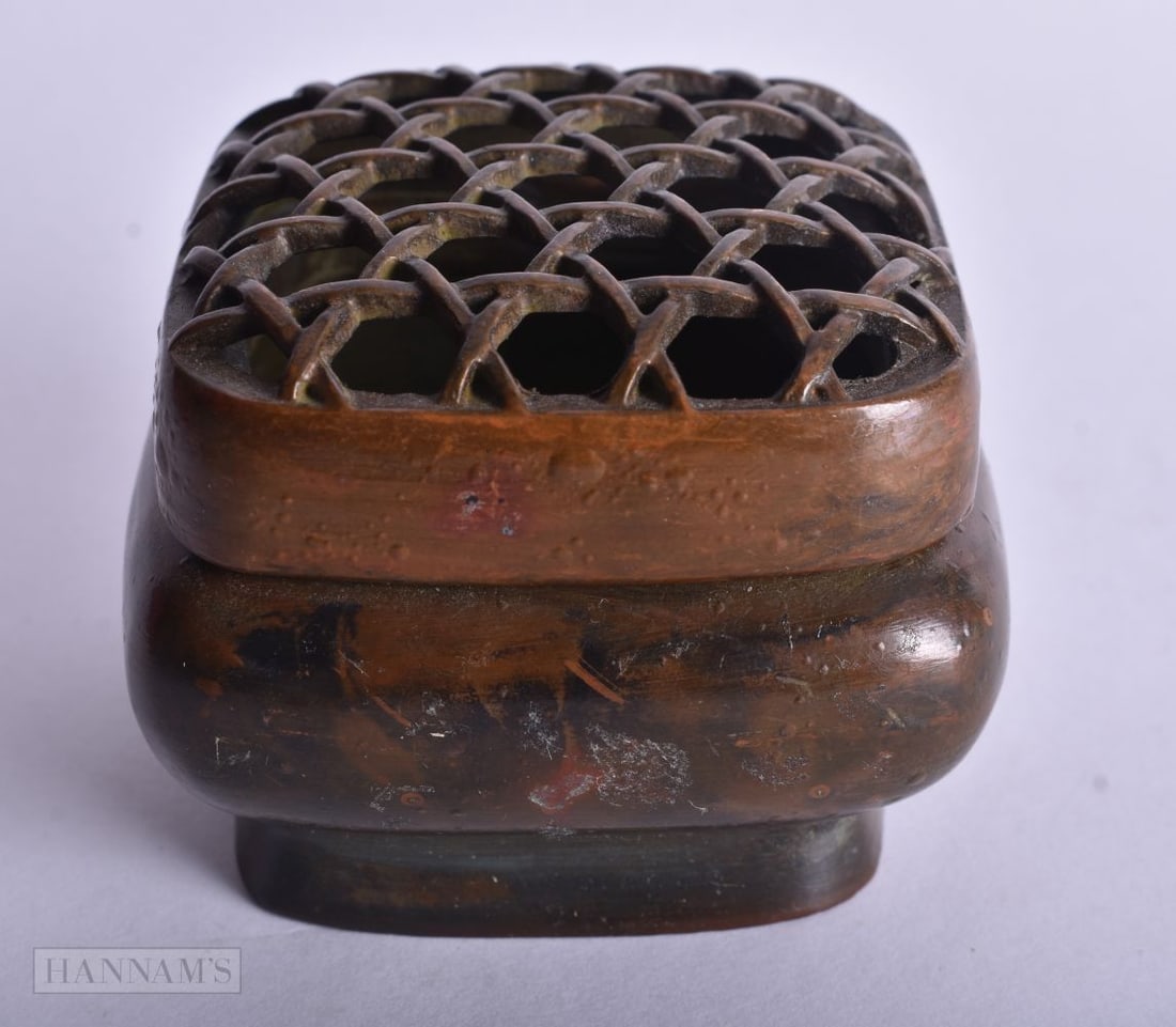 A CHINESE BRONZE CENSER. 6.75 cm x 6.5 cm.: A CHINESE BRONZE CENSER. 6.75 cm x 6.5 cm.