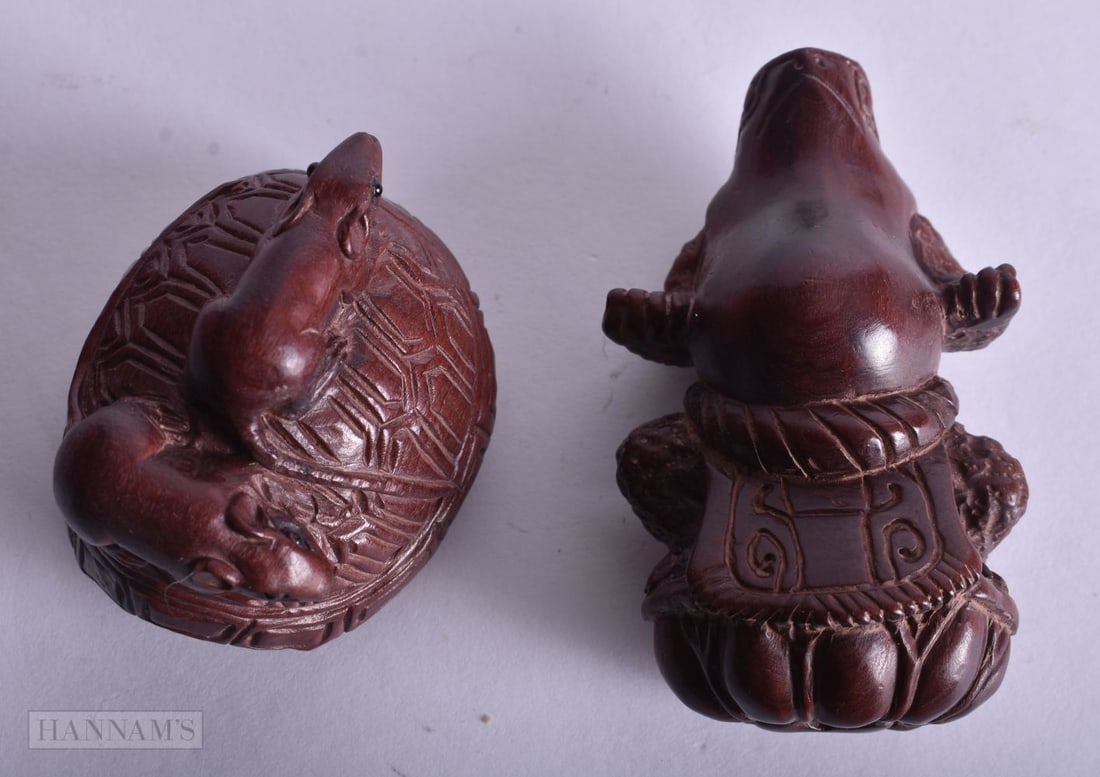 TWO JAPANESE CARVED WOOD NETSUKE. 4.25 cm x 3.25 cm. (2) (1 of 2)