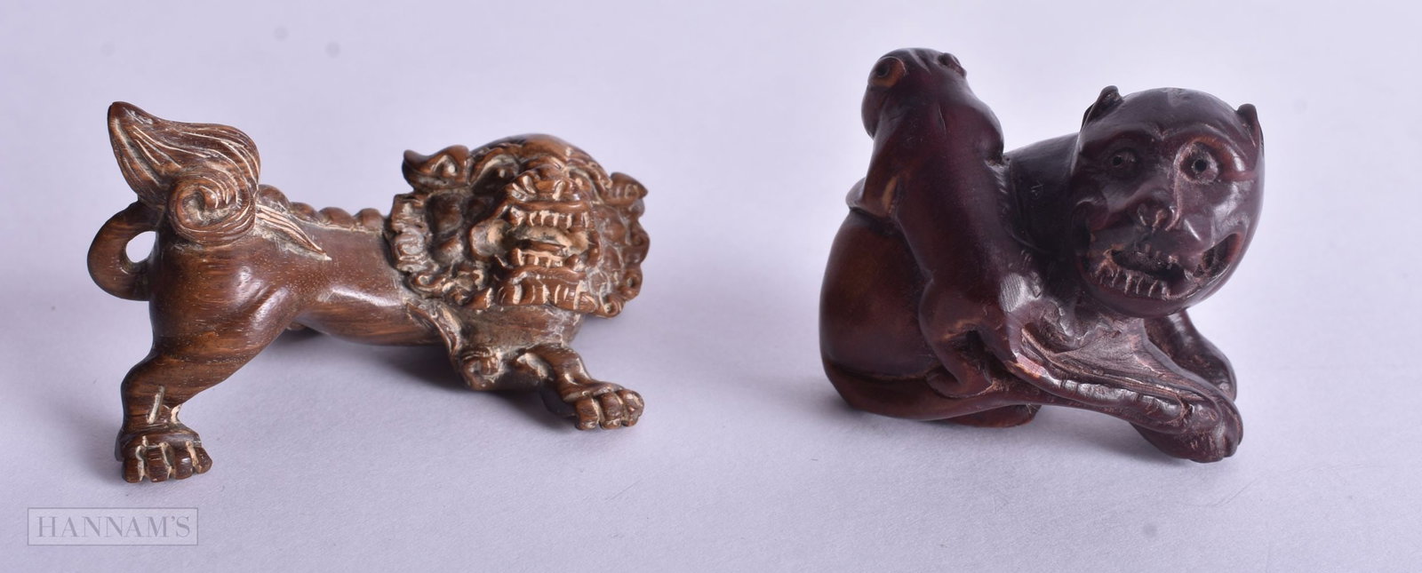 TWO JAPANESE CARVED WOOD NETSUKE. 4.25 cm x 3.25 cm. (2) (1 of 3)