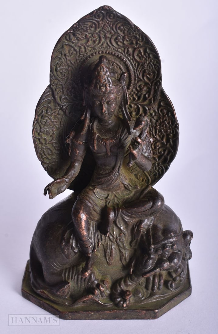 A CHINESE BRONZE GOD. 11.5 cm x 7 cm. (1 of 4)