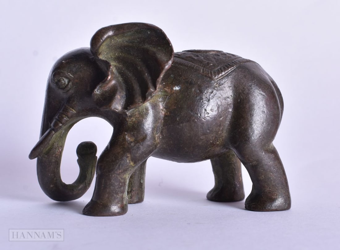 A JAPANESE BRONZE ELEPHANT. 6.75 cm x 4.75 cm. (1 of 3)