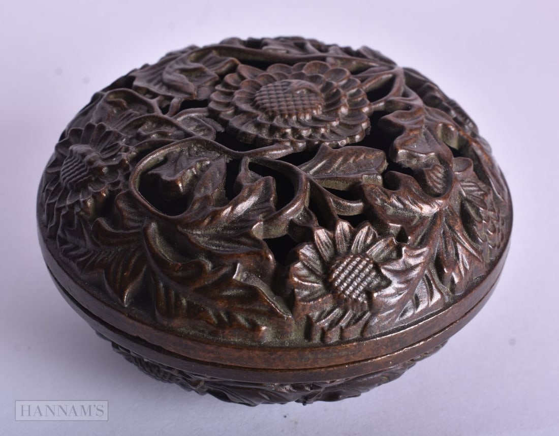 A CHINESE BRONZE CENSER AND COVER. 8.5 cm wide.: A CHINESE BRONZE CENSER AND COVER. 8.5 cm wide.