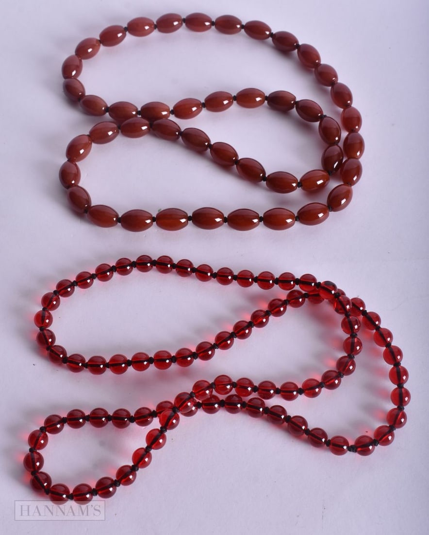 TWO NECKLACES. 72 cm long. (2) (1 of 3)