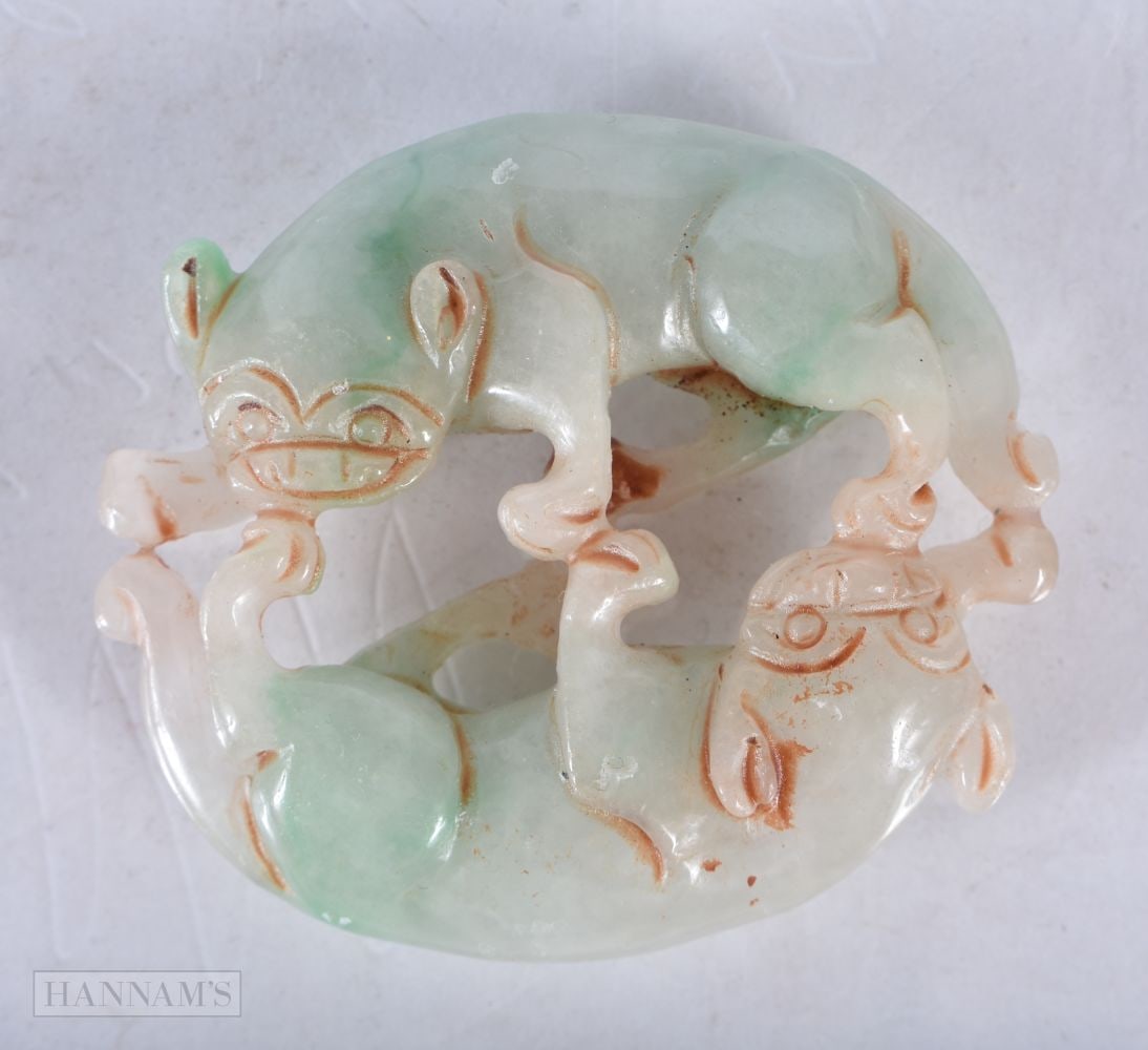 A CHINESE JADE. 5 cm x 5.75 cm. (1 of 2)