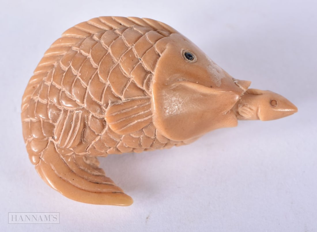 A JAPANESE NUT FISH. 5 cm x 3.25 cm. (1 of 4)